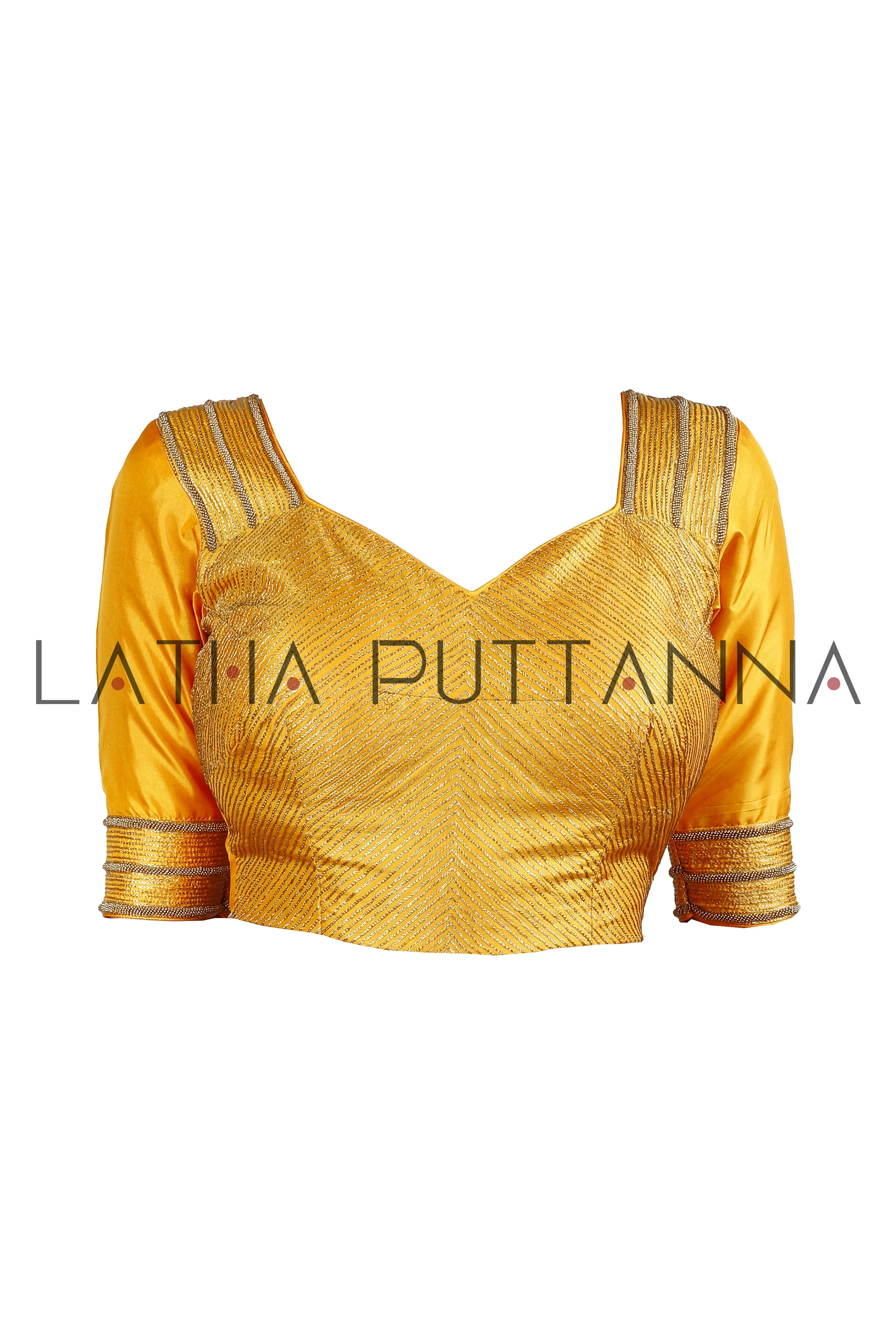 Kumkuma - Dramatic Pink Saree with Gold Polkas