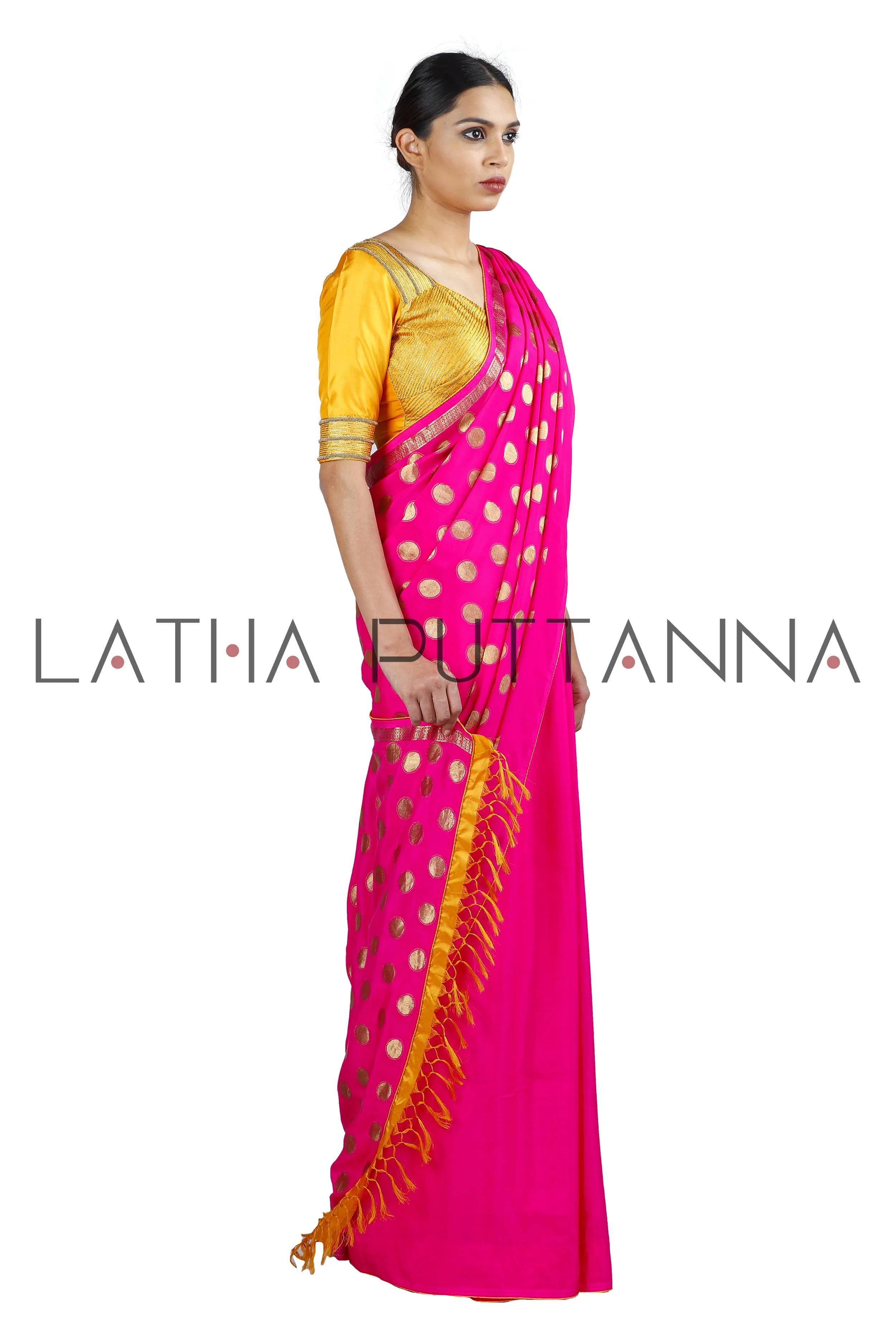 Kumkuma - Dramatic Pink Saree with Gold Polkas